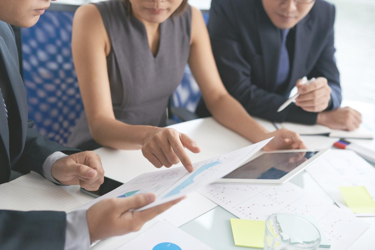 Financial research workspace with documents, calculators and market analysis reports